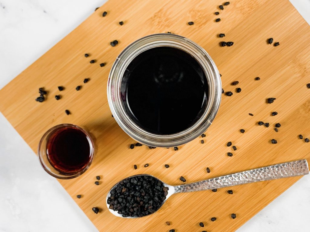 flatlay of elderberry syrup recipe