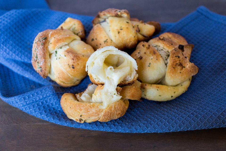 melted vegan cheese coming out of garlic knots