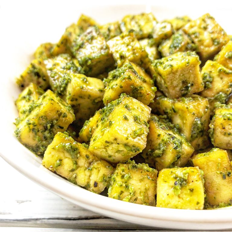 Photo of baked pesto tofu which is one of the best vegan recipes for kids