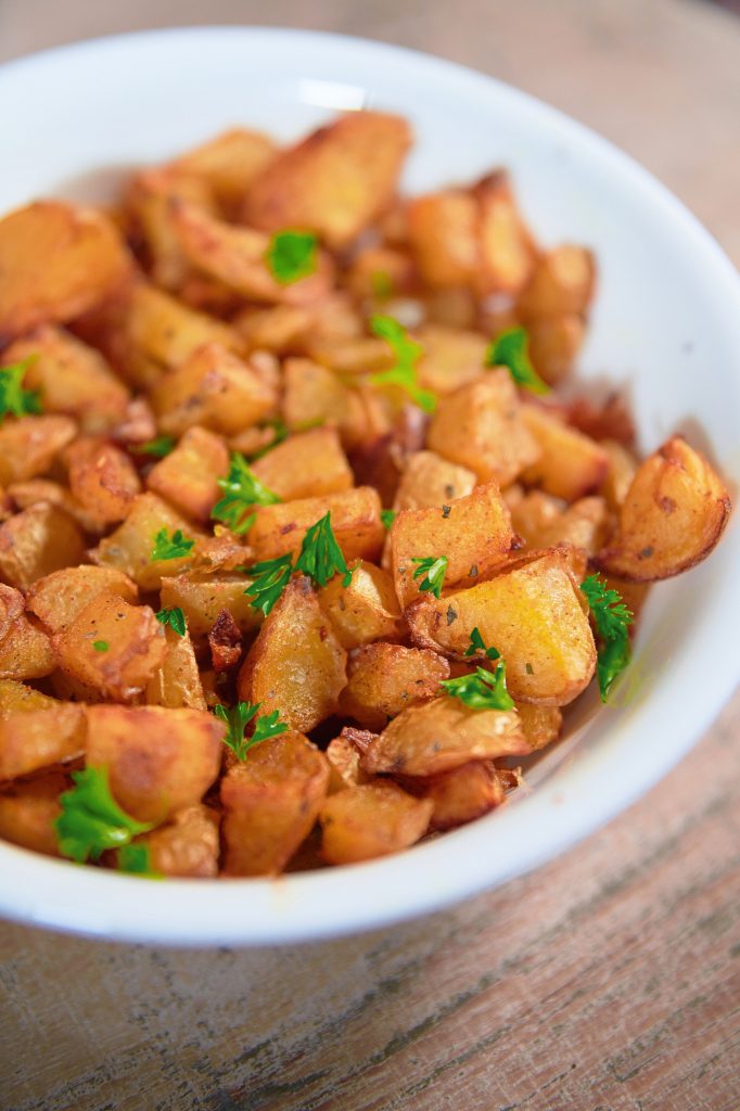 close-up of vegan oven roast potatoes and paprika