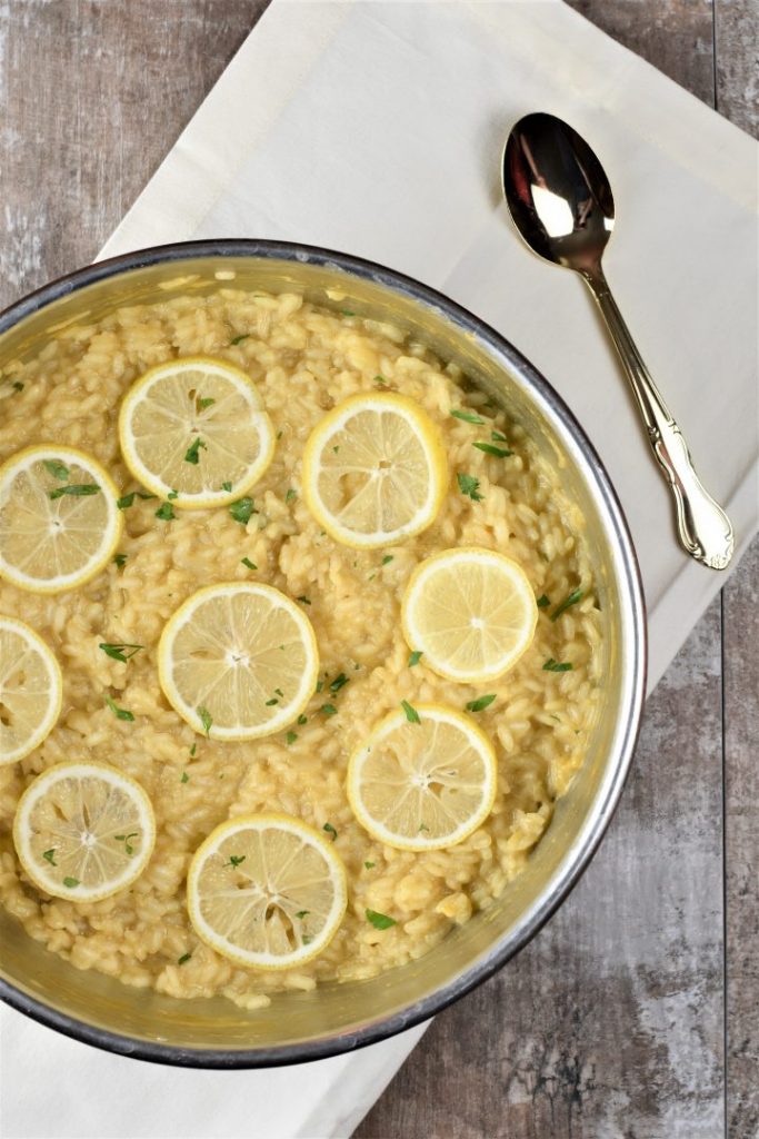 Photo of a large bowl of vegan lemon risotto, one of the classically creamy vegan Italian recipes. 