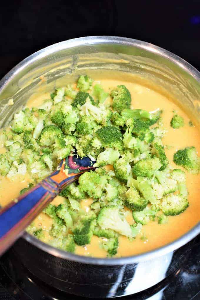 Photo of a large pot of vegan broccoli cheese soup.