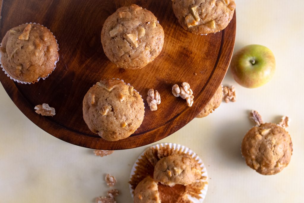 face down view of apple muffins on tray