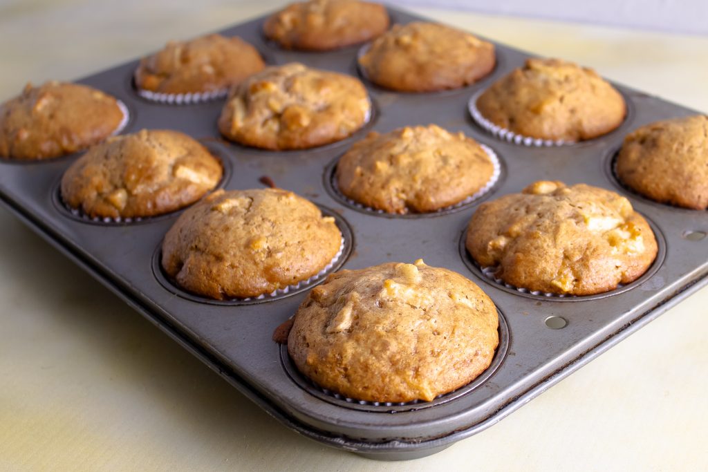 comforting apple muffins in muffin tin