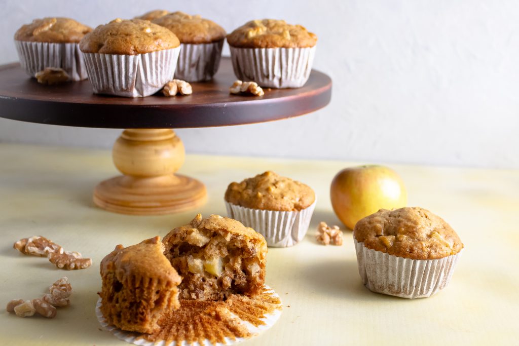 apple walnut muffins on cake stand