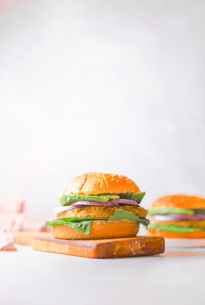 two finished  vegan chickpea burgers on serving platter