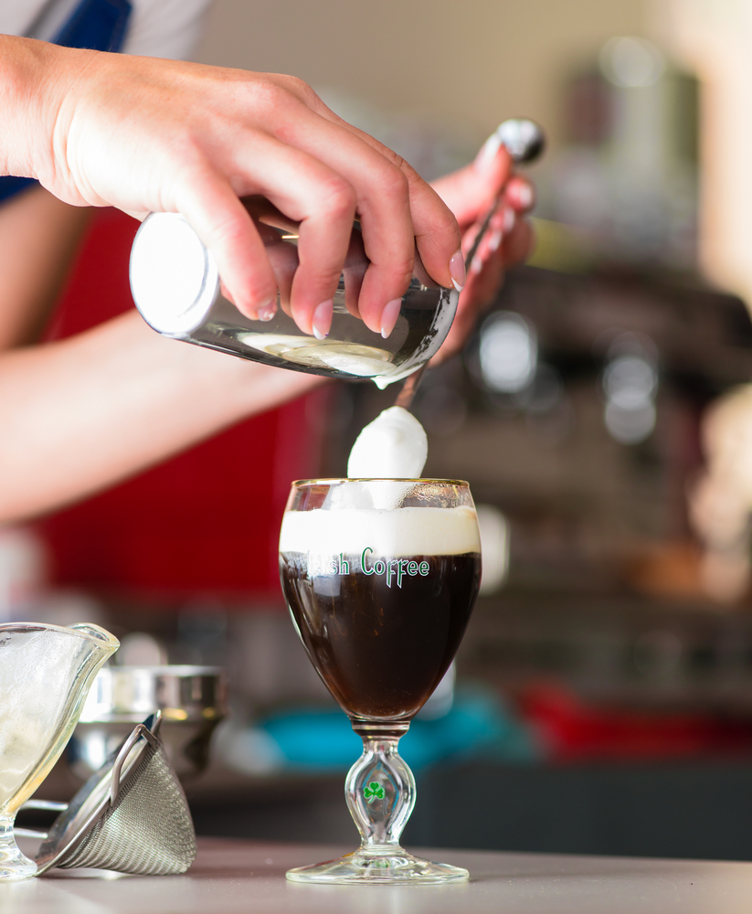 Person making an Irish Coffee