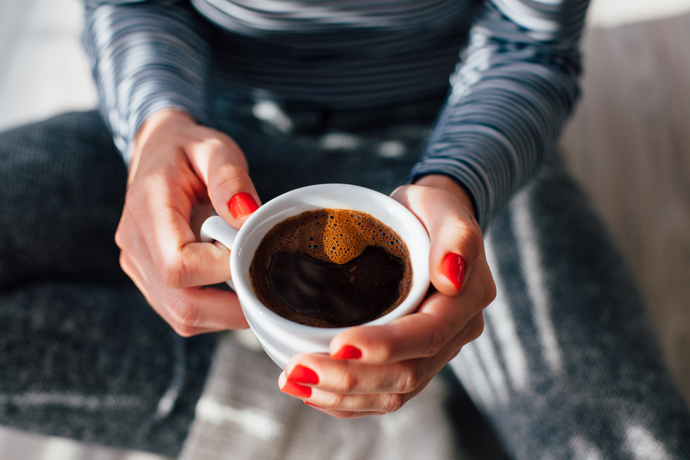 Women drinking a hot drink 