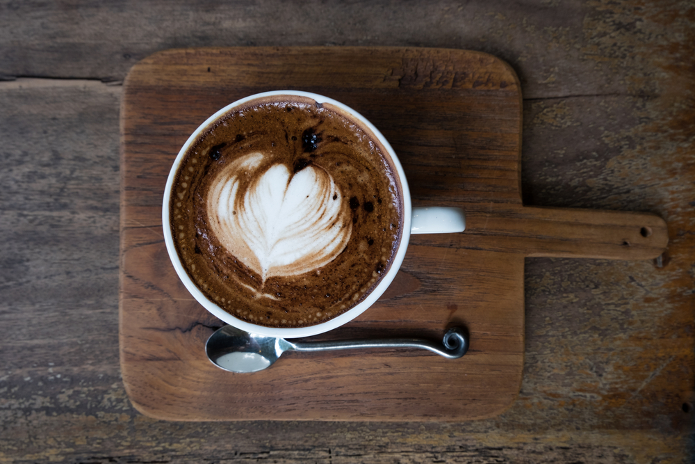 A mocha  on a wooden top