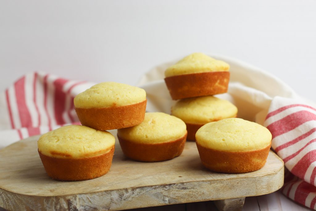 gluten free cornbread muffins on a white background