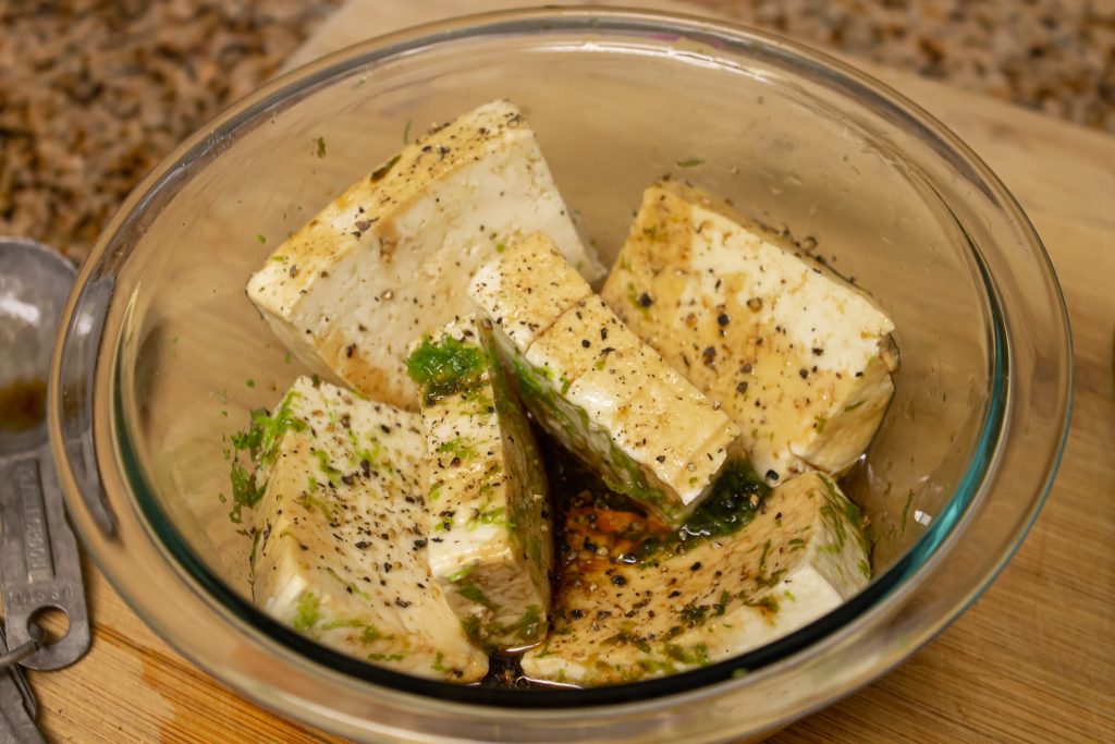 sesame tofu marinating in bowl