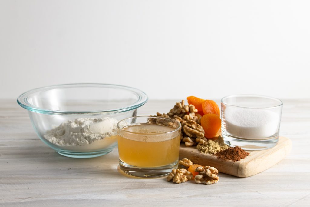 ingredients for making vegan biscotti including aquafaba and fruit