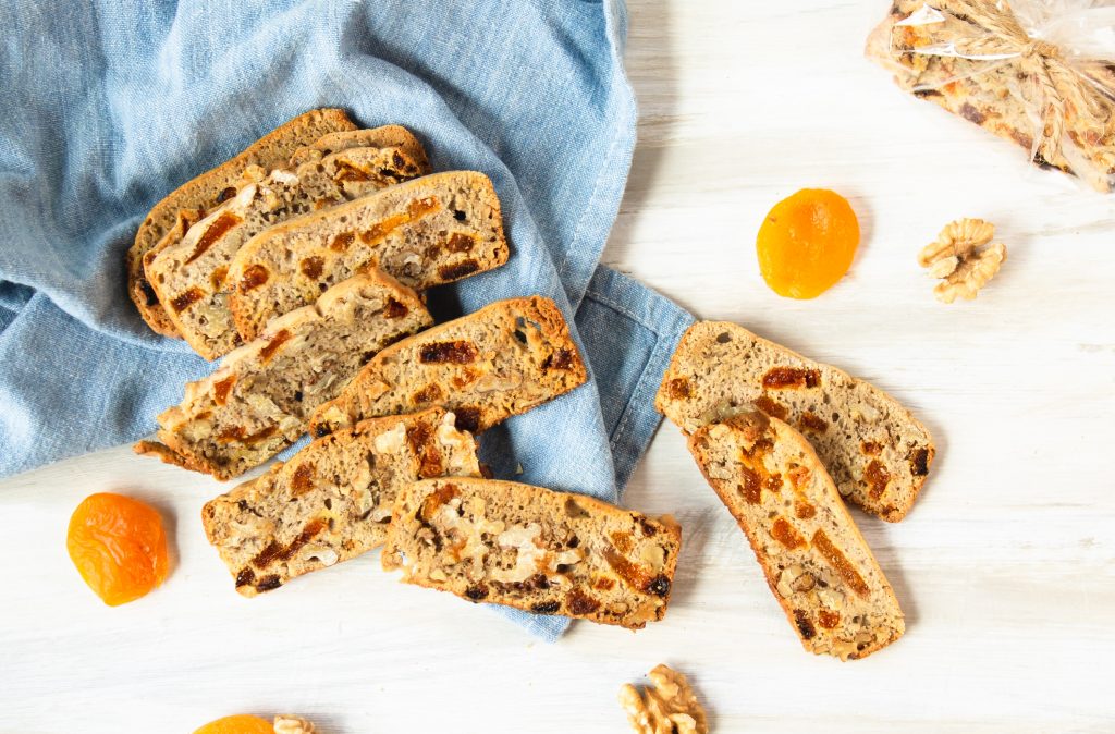 fruit and biscotti cookies on counter