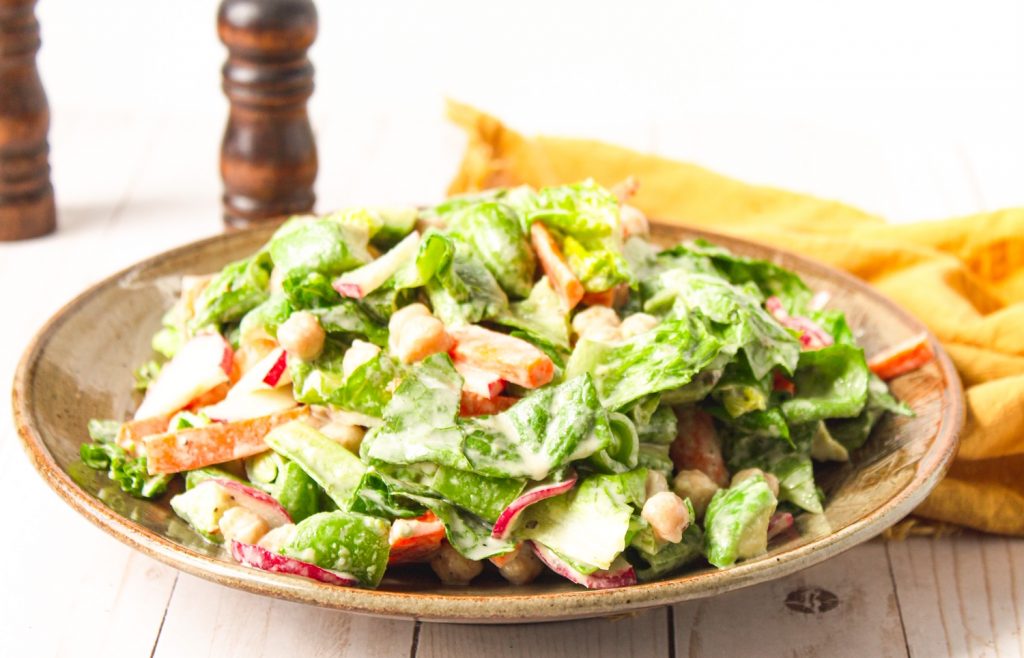 close up of vegan chop salad on plate