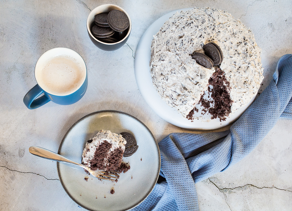 above photo of vegan oreo cake and coffee