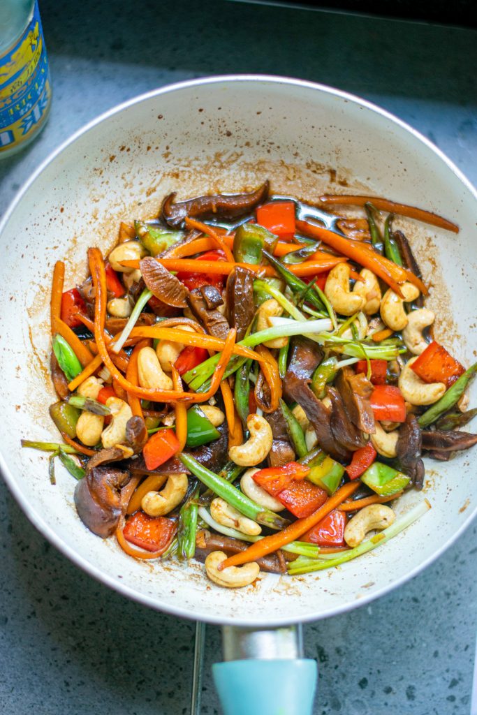 vegetables cooking in kung pao sauce
