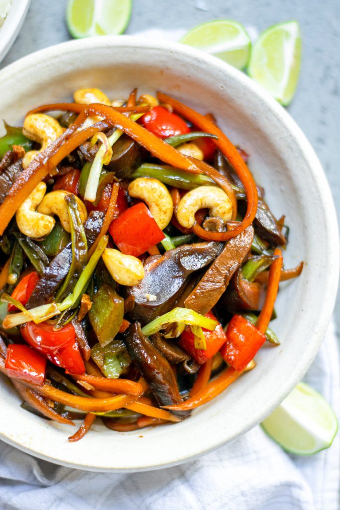 side view of vegan Kung Pao in a bowl