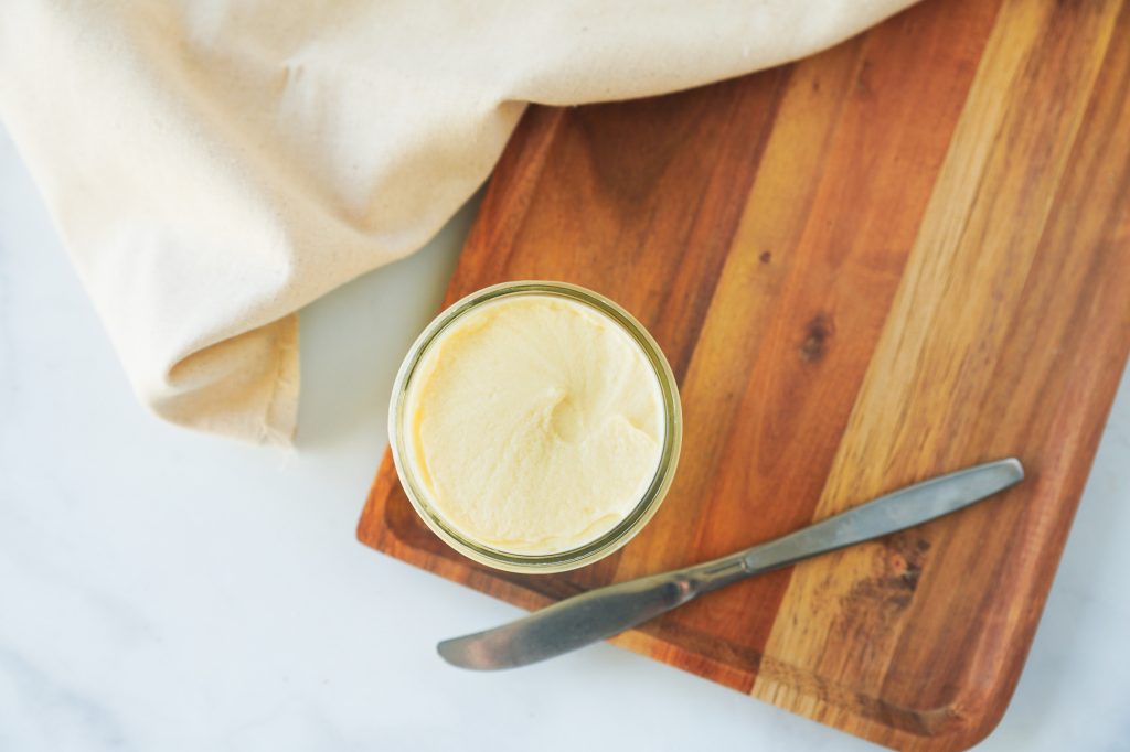 flatlay shot of vegan butter in small glass jar