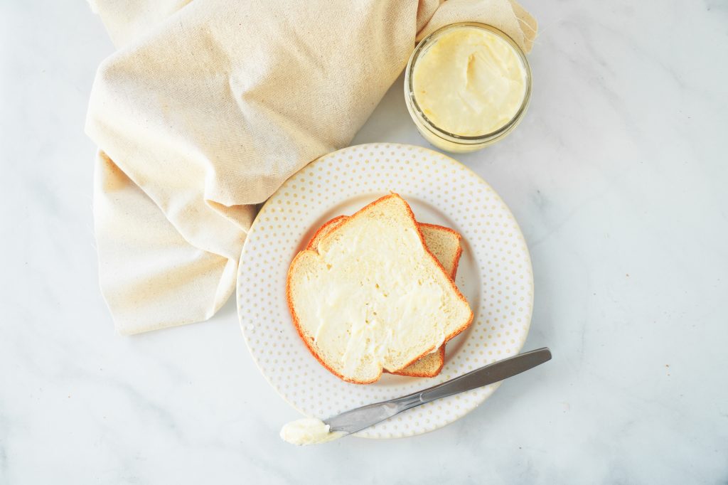 flatlay view of bread with vegan butter recipe spread all over it