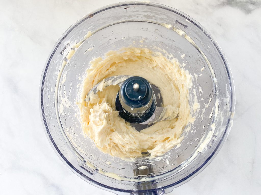 recipe for vegan butter being blended in food processor
