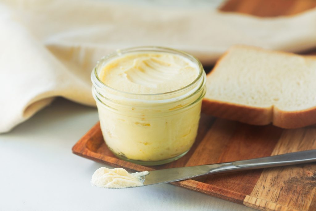 knife with vegan butter on it after spreading