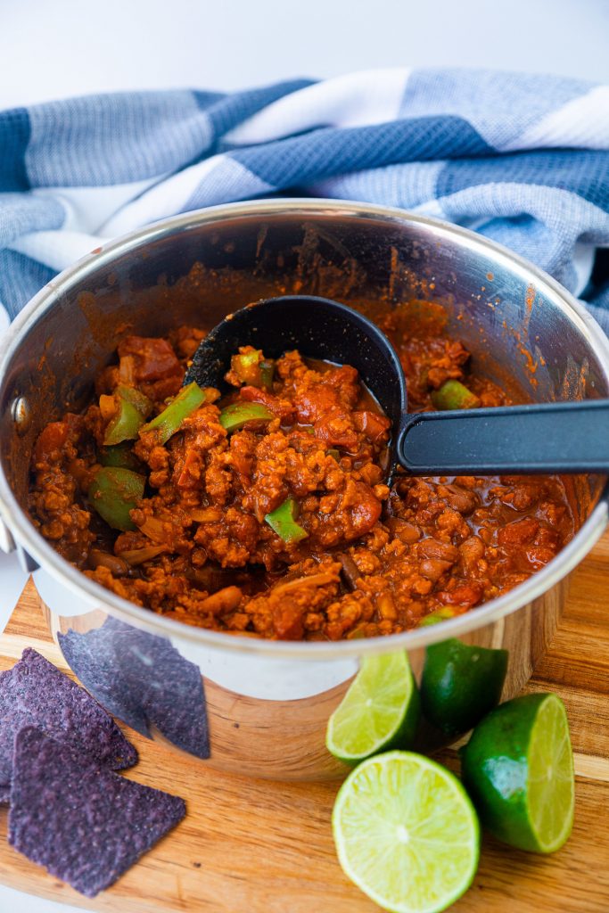 ladle in bowl of vegetarian chili