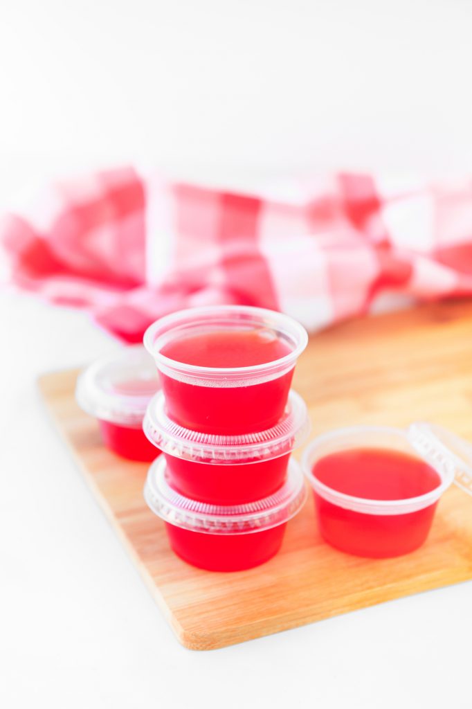 vegan jello shots in plastic containers with lids
