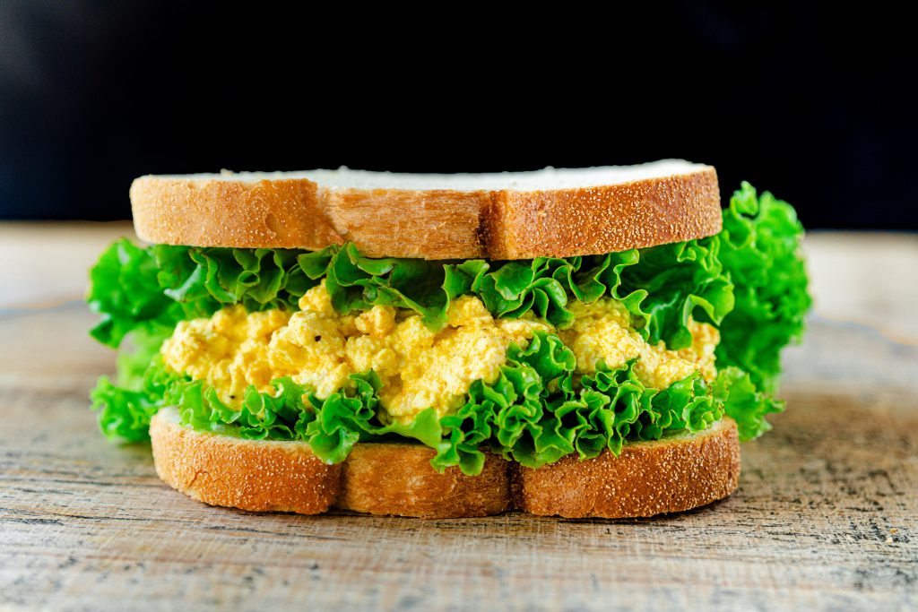 vegan egg salad sandwich with lettuce