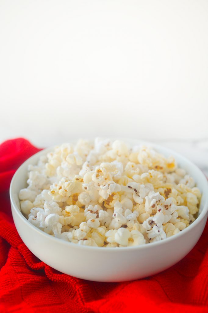 vegan popcorn with butter flavor on red towel
