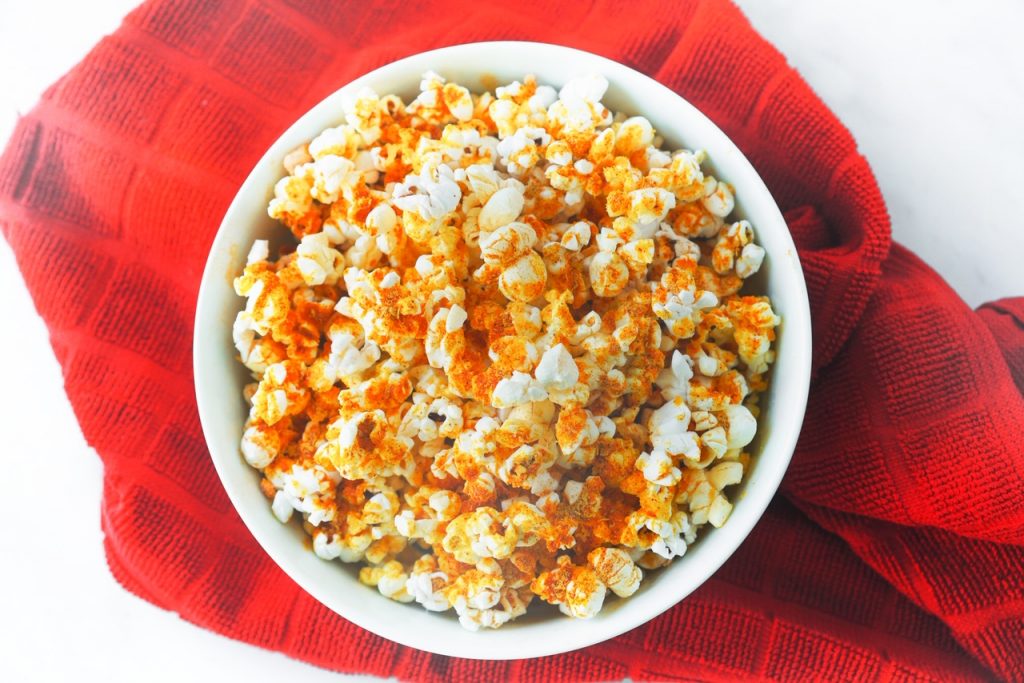 photo of nutritional yeast popcorn with red towel