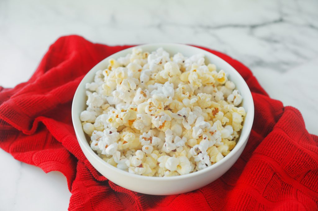 buttery vegan popcorn on red towel