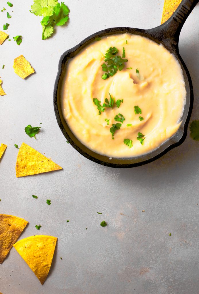 vegan queso in cast iron dish