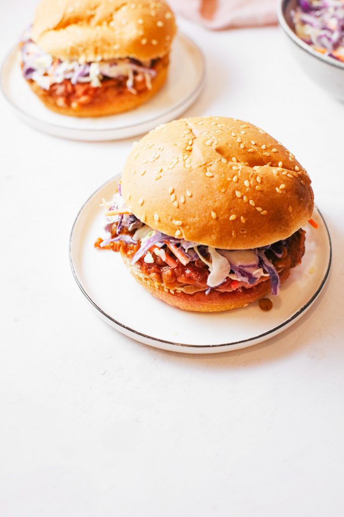 vegan lentil sloppy joes on plate and burger buns