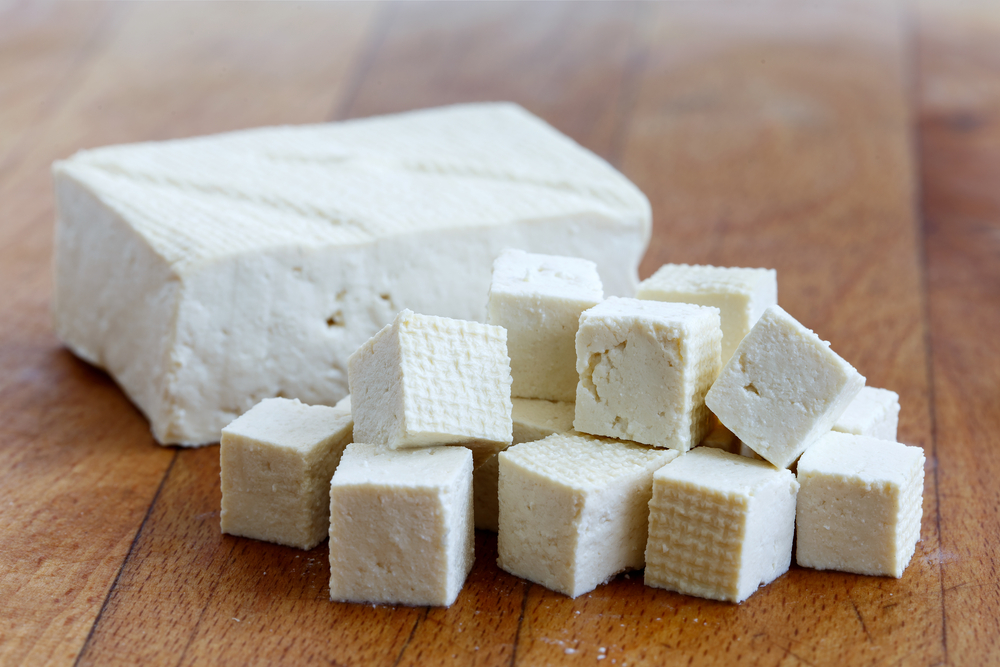 cubed tofu on cutting board