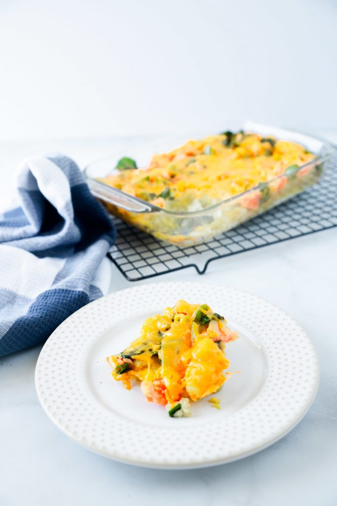 slice of vegetarian egg bake with blue towel