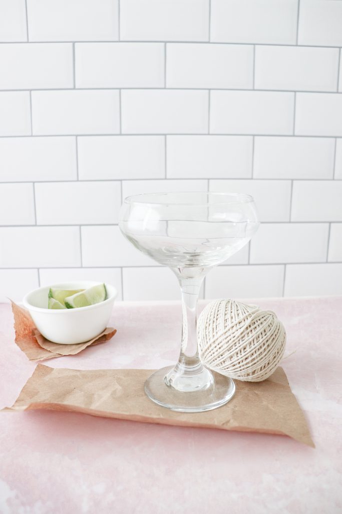 margarita glass with twine and limes