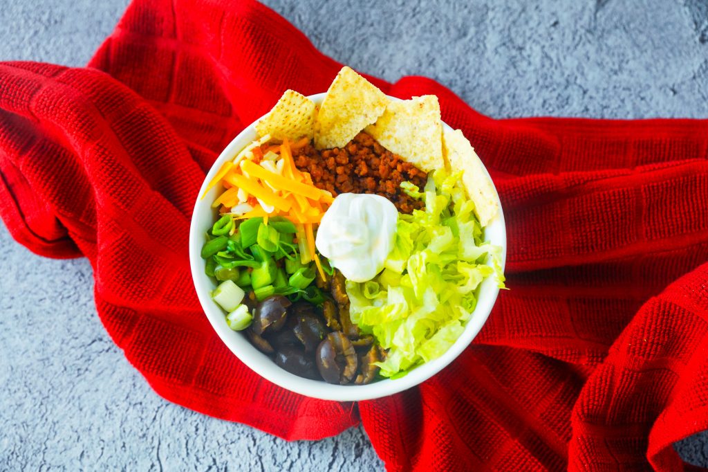 vegan burrito bowl on red dish towel