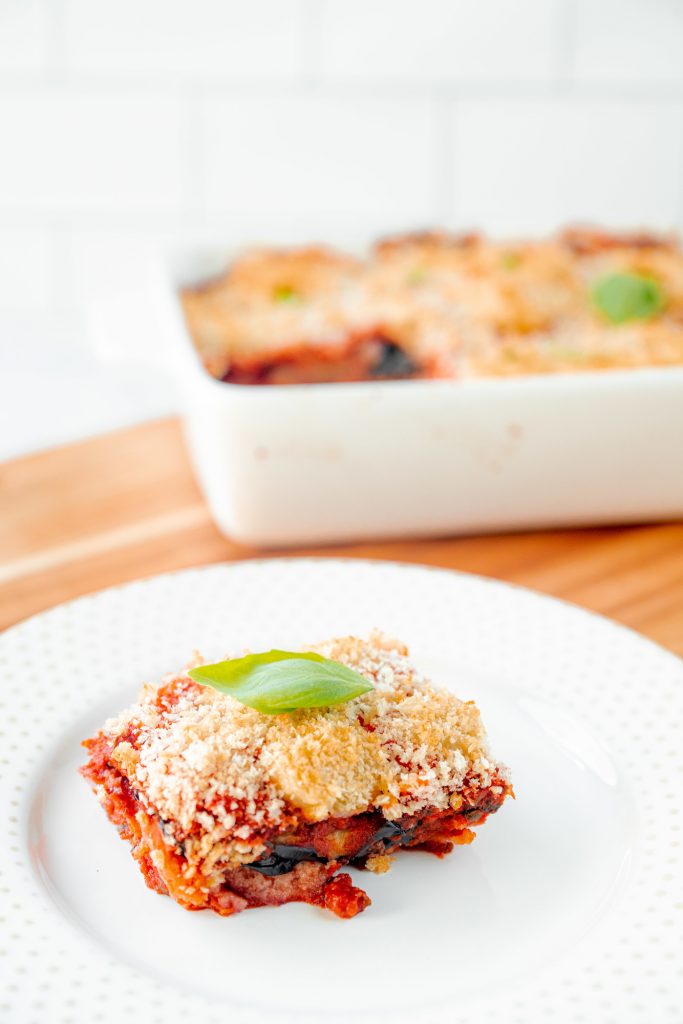 slice of vegan eggplant parm with basil