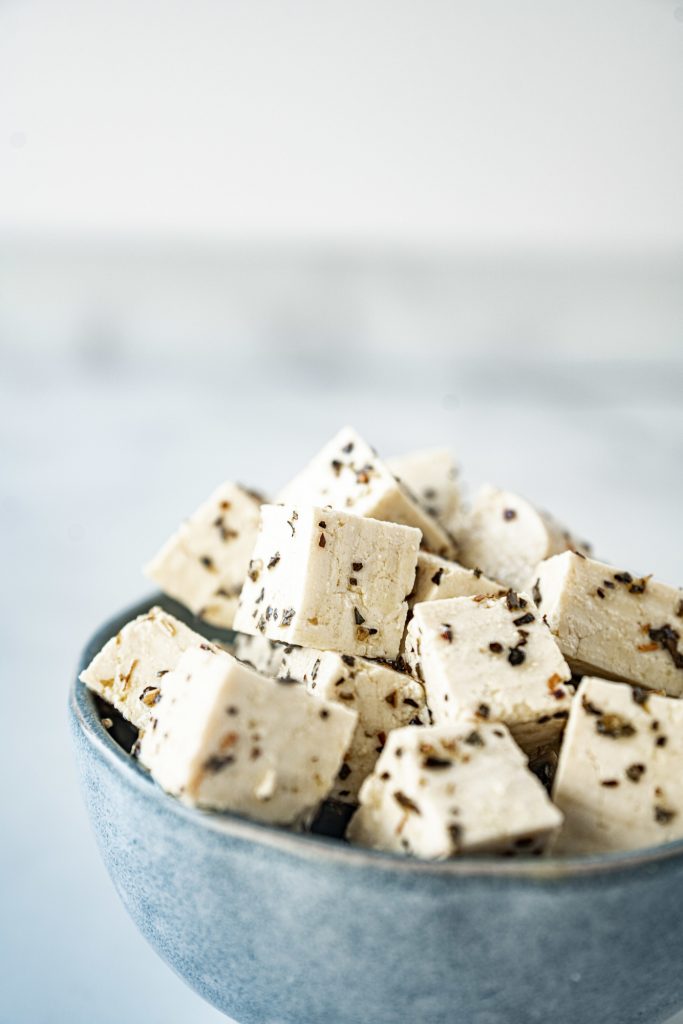 close up photo of vegan feta cheese made from tofu and oil