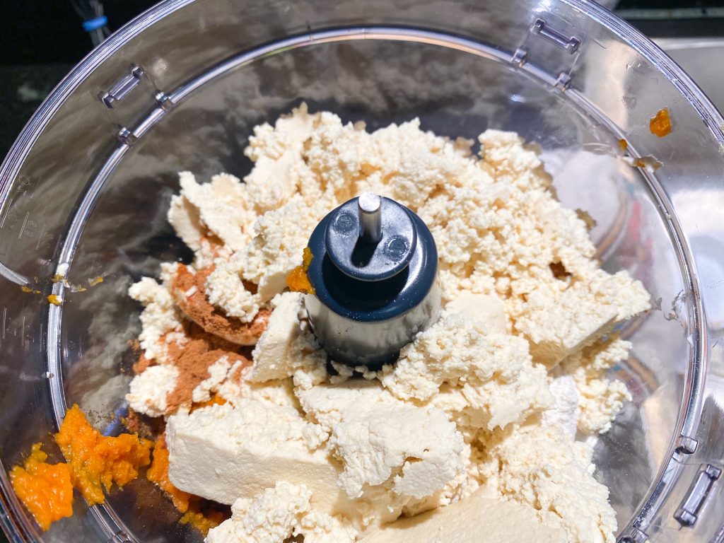 tofu and pumpkin cheesecake ingredients in blender