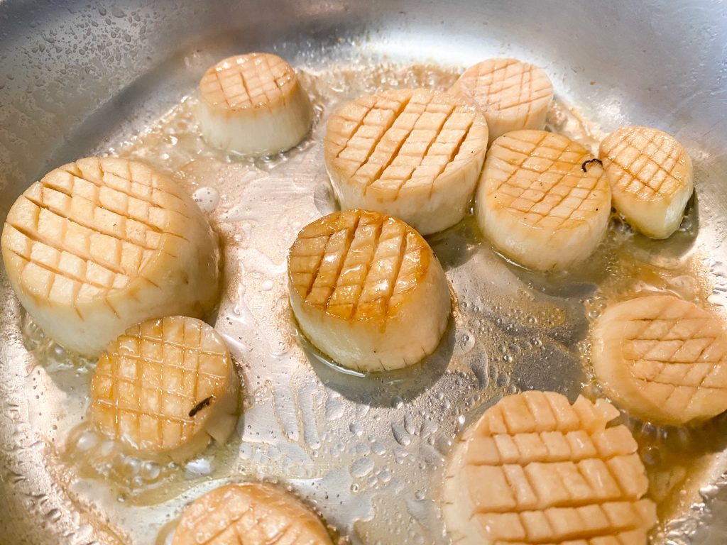 beginning process of cooking vegan scallops out of king oyster mushroom stems