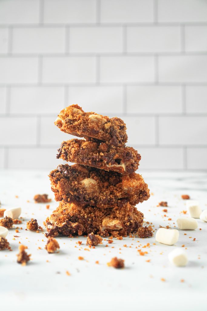 stacked vegan smores bars on kitchen counter