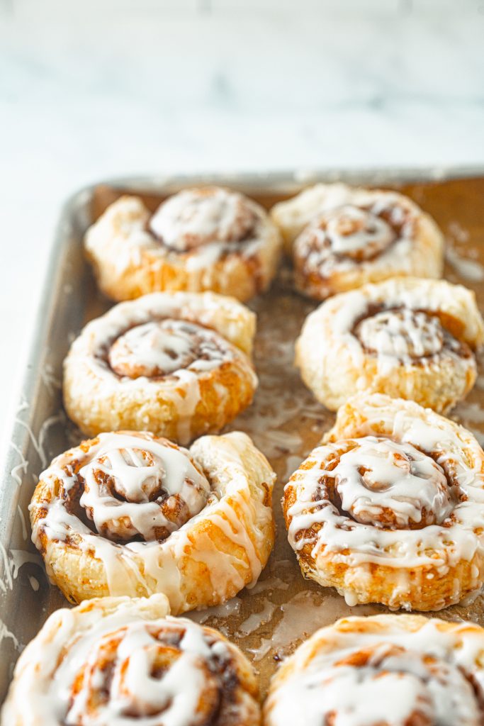 vegan cinnamon rolls from puff pastry on baking sheet