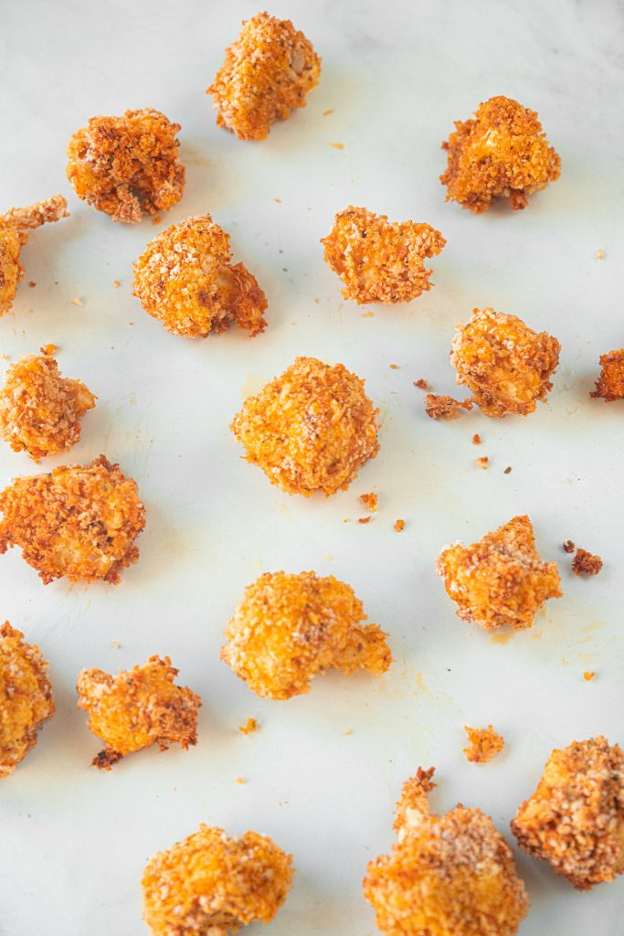 small pieces of crispy baked cauliflower bites that are vegan