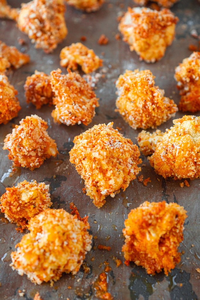 vegan crispy breaded cauliflower on baking dish