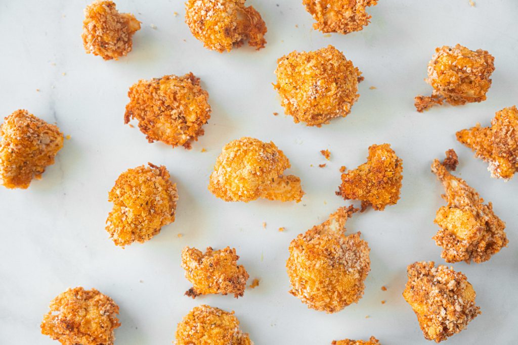 breaded cauliflower on white background