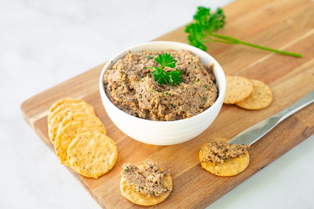 vegan pate recipe in a bowl with parsley