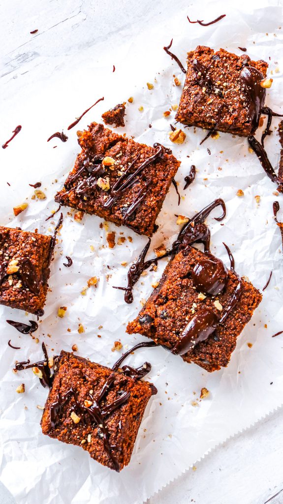 sideways view of vegan pumpkin brownies that are also gluten free and keto