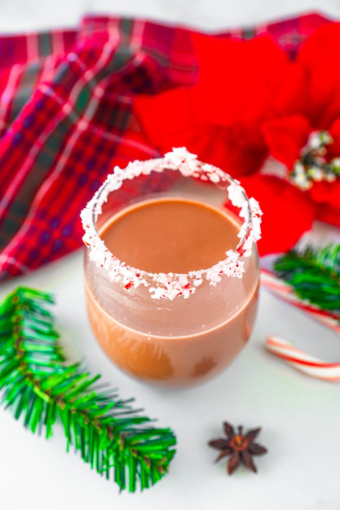 chocolate peppermint cocktail with candy cane rimmed glass