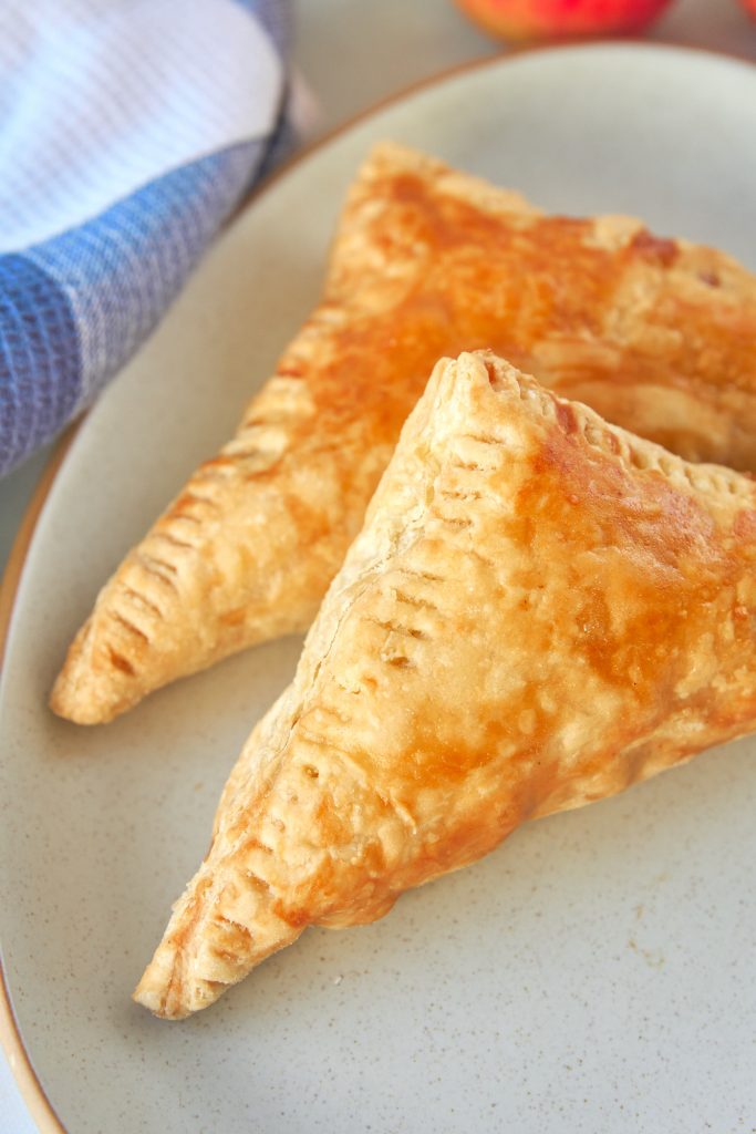 close up of vegan apple turnovers with no glaze on a dish